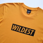 Close up of gold t shirt with black Wildest block print
