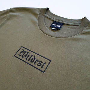 Close up of army green long sleeve t shirt with black Wildest blackletter box print