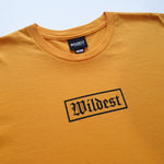 Close up of gold t shirt with black Wildest blackletter box print